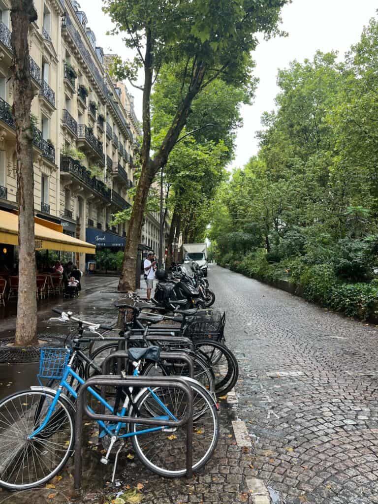 Mitte Hostel street view with bicycles and trees in Berlin, Germany.