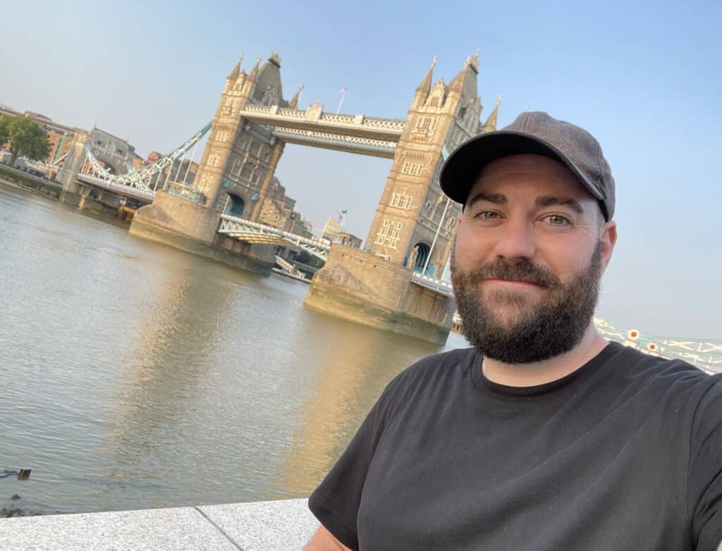 Man in front of Tower Bridge