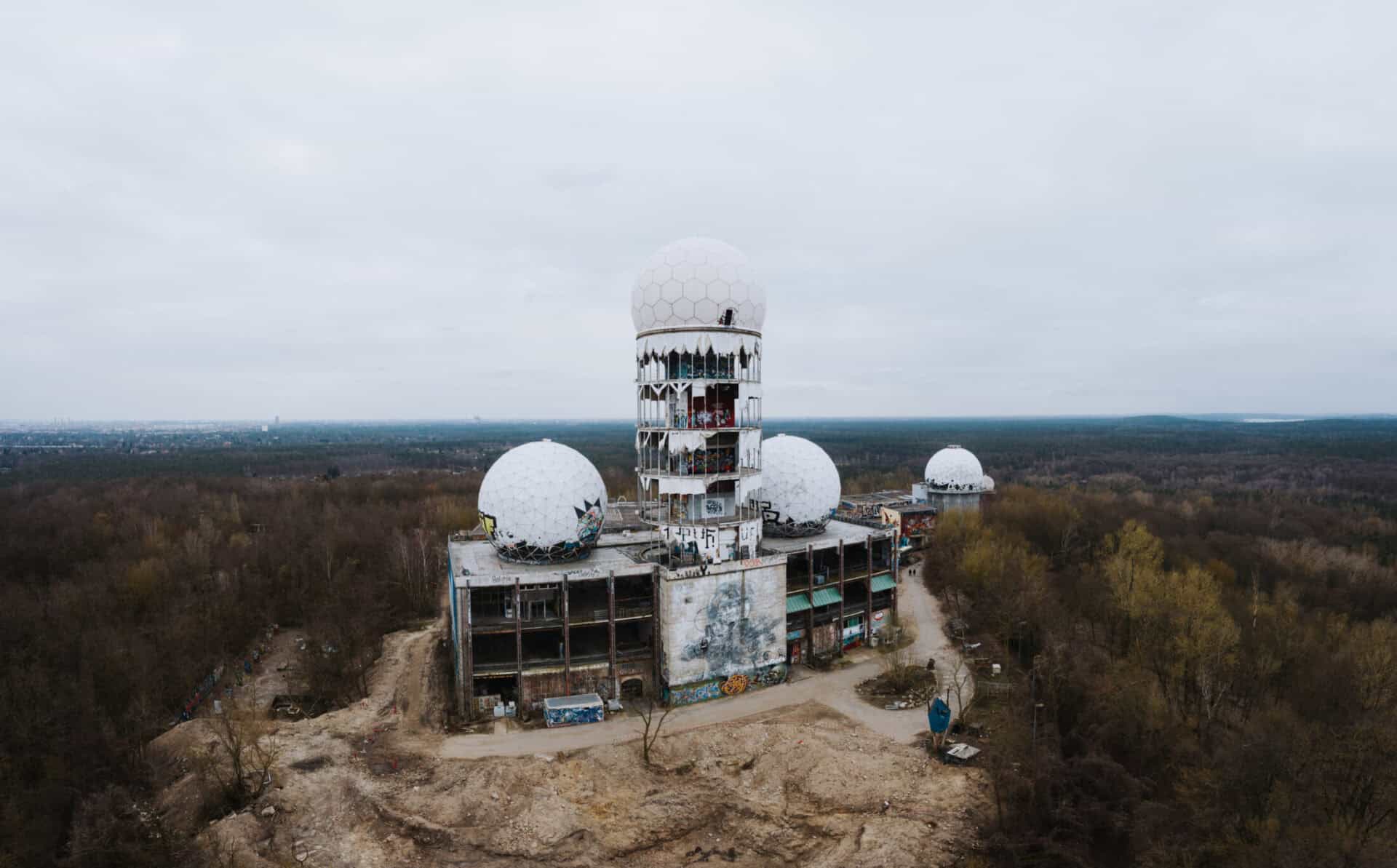 Abandoned radar station in Berlin's Mitte area with futuristic domes and tower.