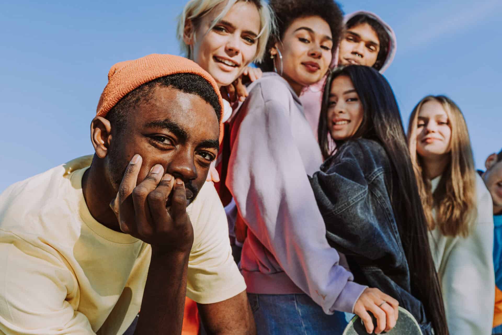 Young diverse group of friends enjoying sunny day in Berlin, smiling and having fun together.