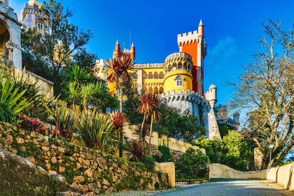 Historic Berlin castle with lush gardens and vibrant architecture.
