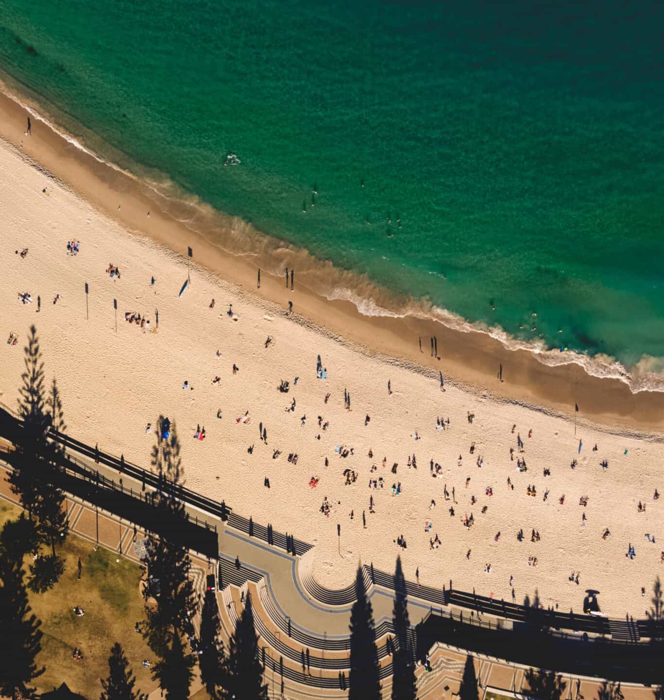 Beach and ocean view with people enjoying the seaside.