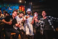 Group of friends enjoying drinks and fun at St Christopher's bar.